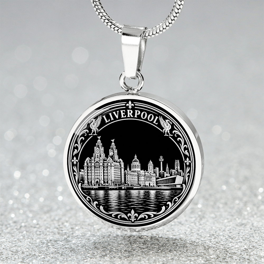 Silver Liverpool skyline necklace featuring the Royal Liver Building, historic waterfront architecture, river reflections and decorative floral border
