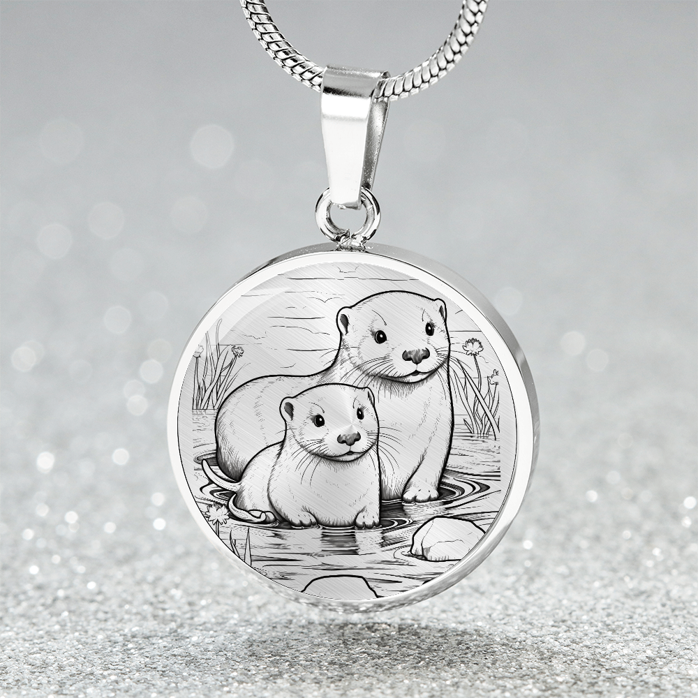 Sea Otter Couple Necklace featuring two otters together in a delicate black-and-white shoreline illustration on a silver-colored pendant.