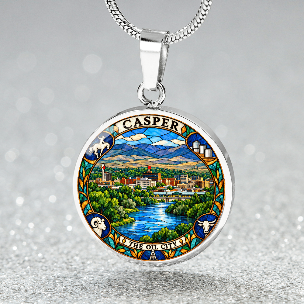 Silver Casper Wyoming necklace featuring stained-glass artwork of the city skyline, blue river, green trees, mountains and The Oil City lettering