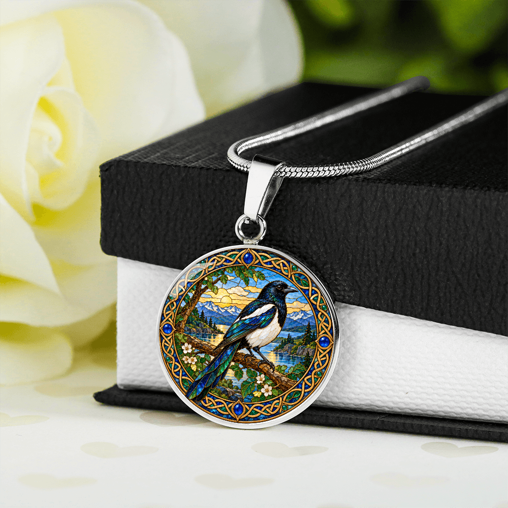 Close-up of magpie pendant featuring stained-glass-inspired design