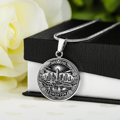 Silver Edmonton skyline necklace featuring downtown buildings, North Saskatchewan River bridge, radiant sun and floral border