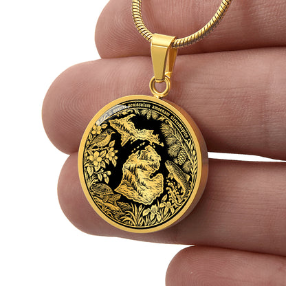 Gold finish Michigan peninsula necklace featuring forest landscapes, wildlife, botanical border and Michigan Latin state motto
