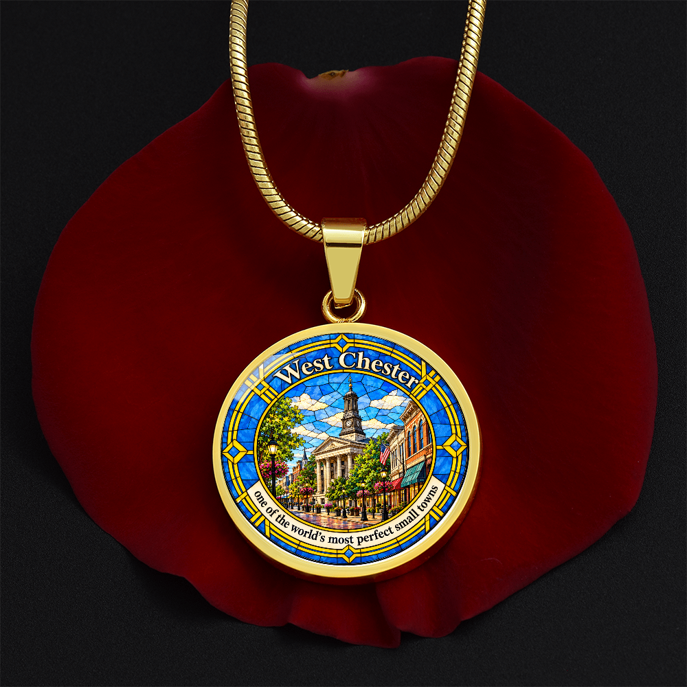 Gold West Chester Pennsylvania necklace with blue and gold stained-glass artwork, Chester County Courthouse clock tower and historic downtown buildings on a rose petal mockup.