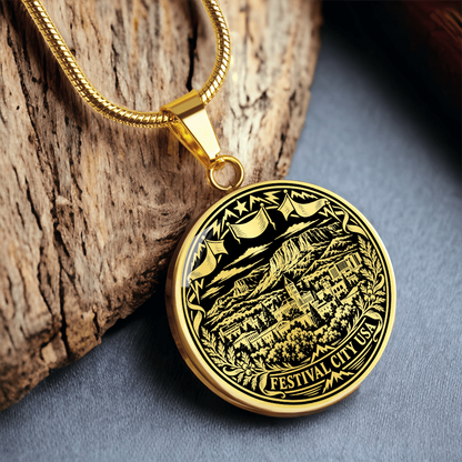 Gold finish Cedar City Utah pendant with mountain landscape, vintage buildings, festival flags and floral woodcut border