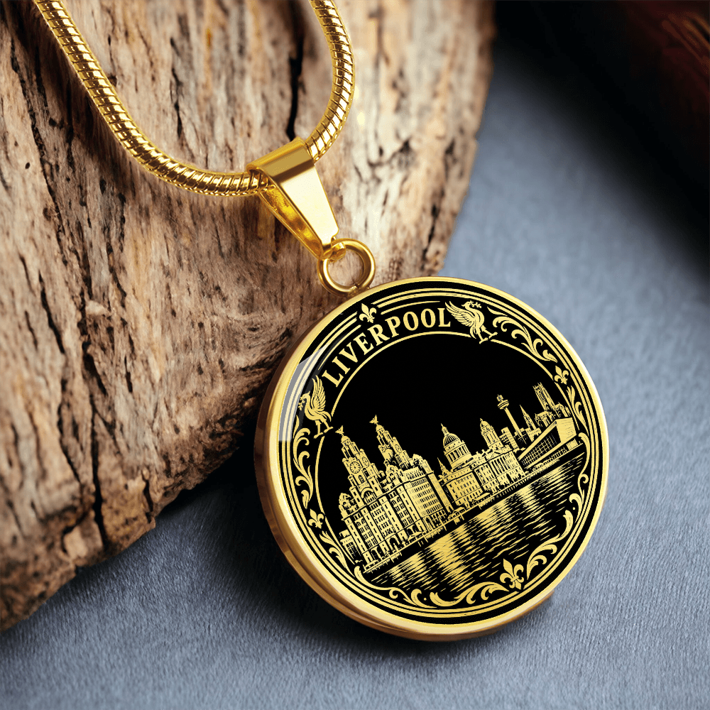 Gold finish Liverpool waterfront necklace with historic skyline, Royal Liver Building, black and gold river artwork and ornate circular border
