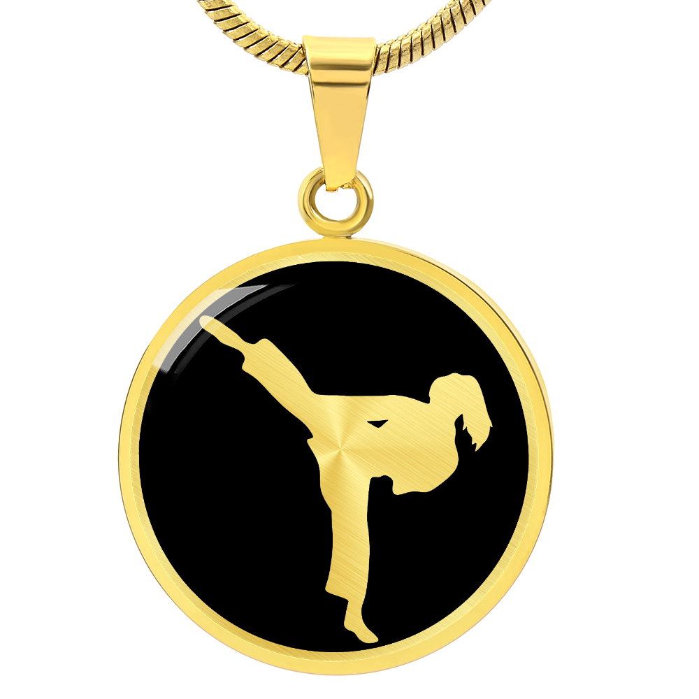 Gold finish karate girl necklace featuring female karate practitioner artwork on a circular pendant.