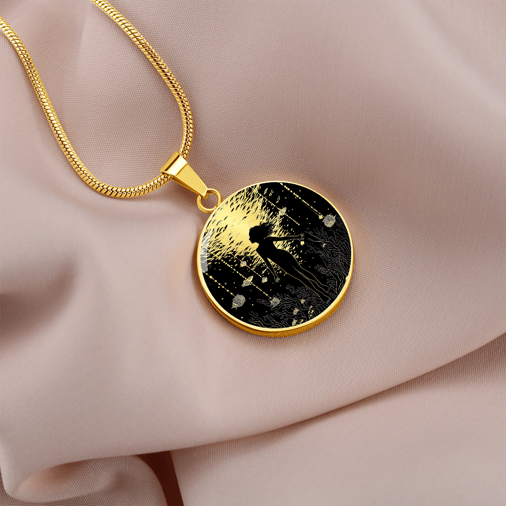 gold plated Scuba diving necklace featuring female diver artwork on a circular pendant, a jewelry gift for women who love diving.