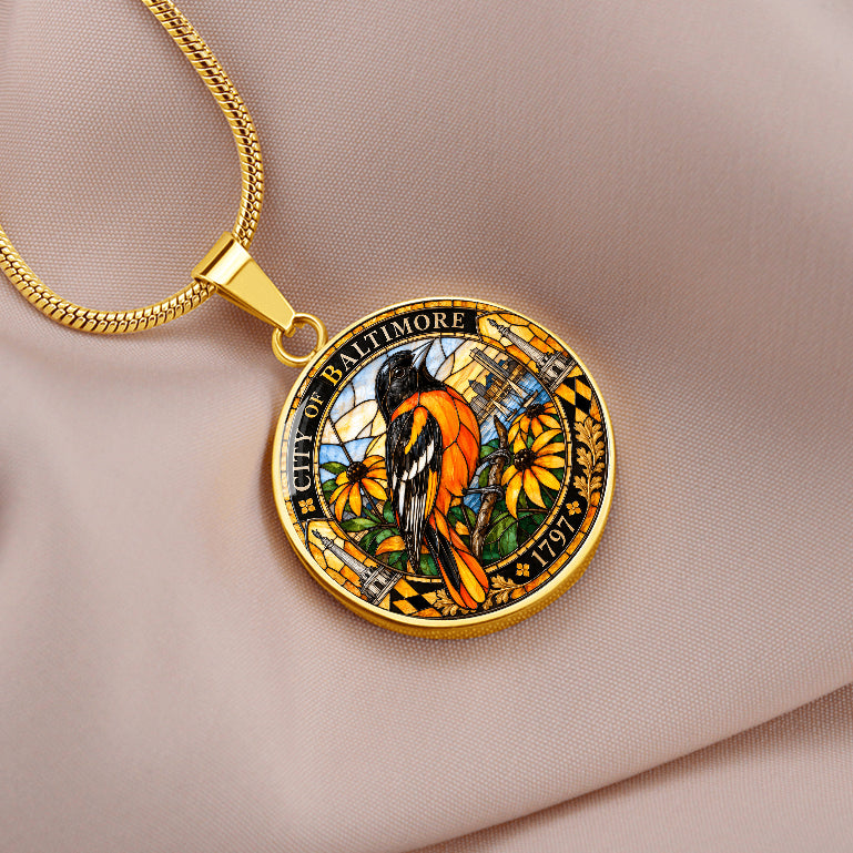 Baltimore Oriole stained glass pendant necklace on silver chain with colorful bird, floral design and Baltimore city heritage border
