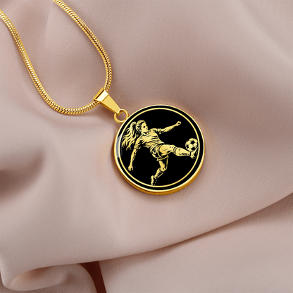 Gold finish female soccer player necklace with striking black circular artwork