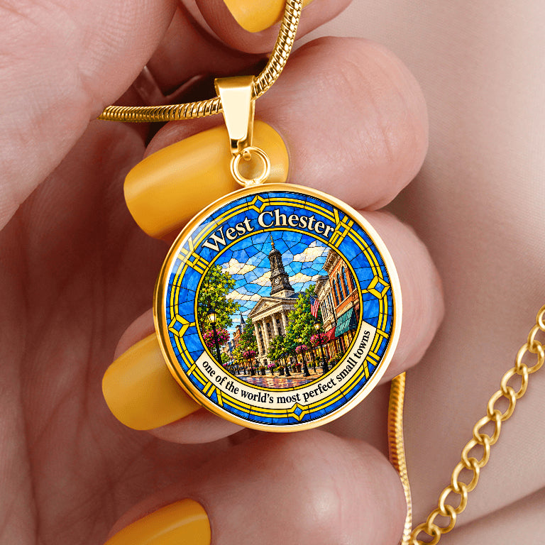 Gold finish West Chester PA courthouse necklace featuring colorful flowers, American flags, historic architecture and decorative stained-glass border