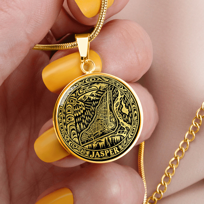 Gold finish Jasper Alberta map pendant with town street-grid illustration, mountain scenery, woodland artwork and Jasper inscription