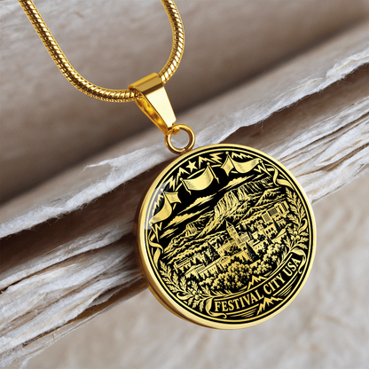 Gold finish Cedar City Utah pendant with mountain landscape, vintage buildings, festival flags and floral woodcut border