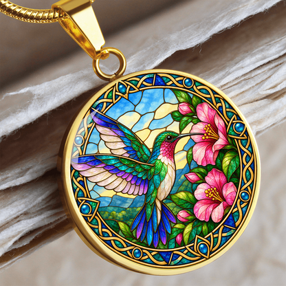 Hummingbird pendant necklace featuring colorful bird artwork