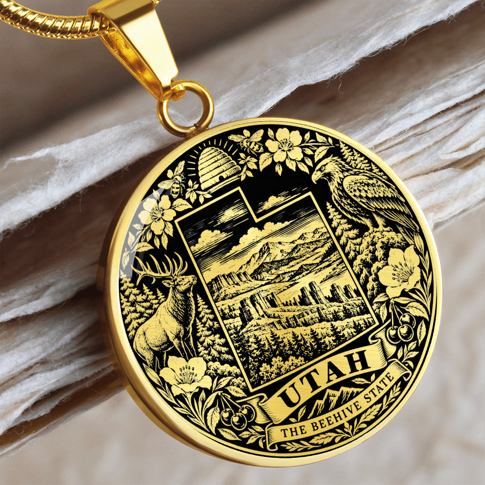 Gold finish Utah Beehive State pendant with stylized Utah outline, mountain forest, beehive, elk, eagle and botanical border
