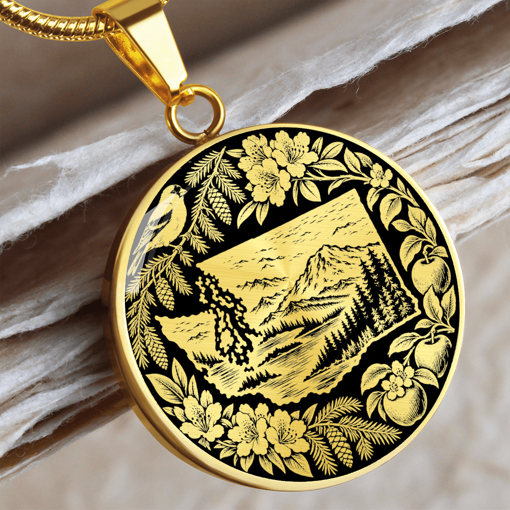 Gold finish Washington State mountain necklace with evergreen forest, bird, rhododendron-inspired flowers and ornate botanical design
