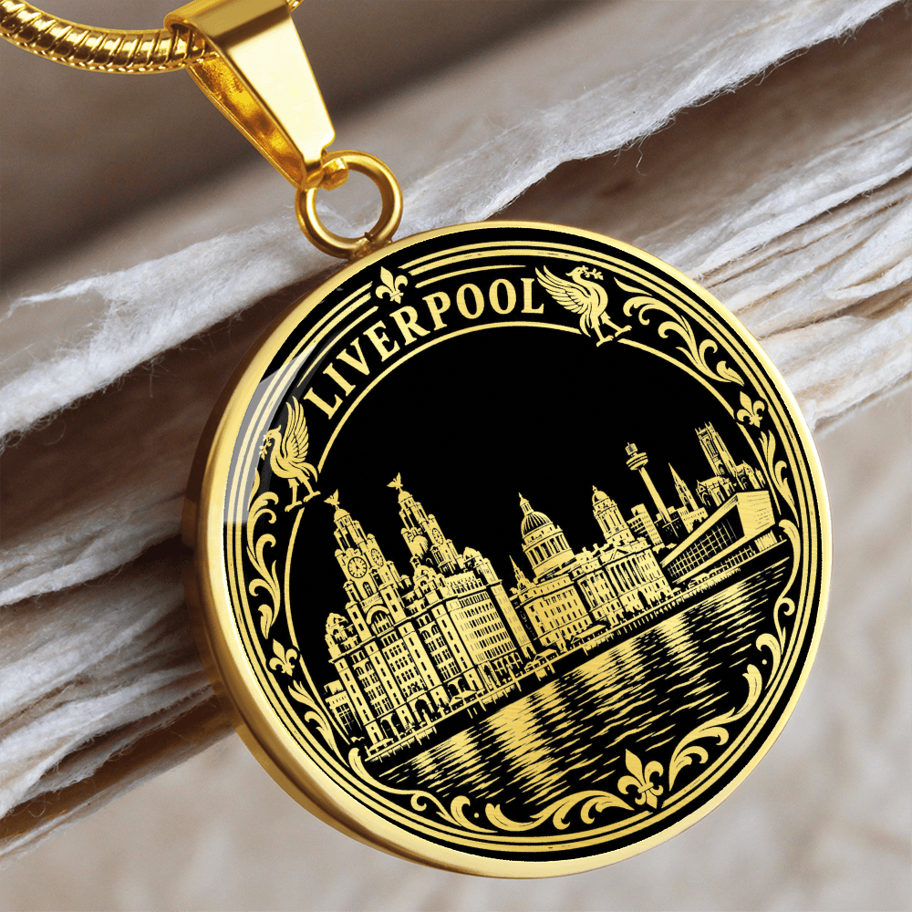 Gold Liverpool skyline necklace featuring the Royal Liver Building, historic waterfront architecture, river reflections and decorative floral border
