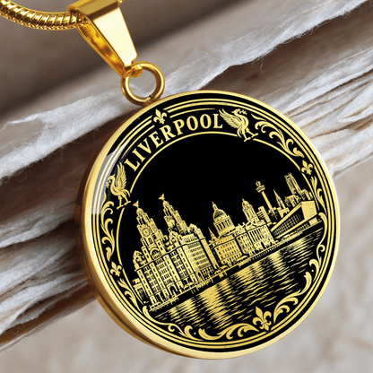 Gold Liverpool skyline necklace featuring the Royal Liver Building, historic waterfront architecture, river reflections and decorative floral border