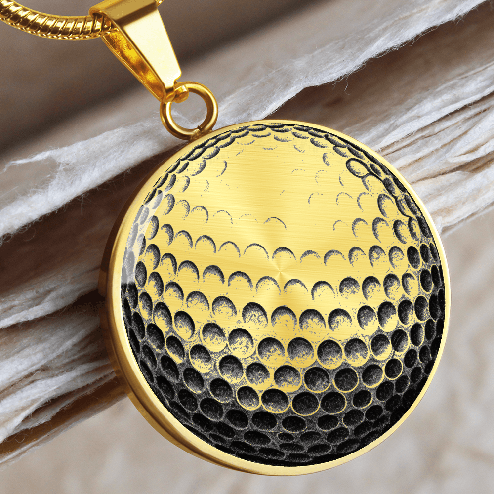 Gold Golf ball necklace featuring golf-inspired artwork on a circular pendant, a thoughtful jewelry gift for golfers.