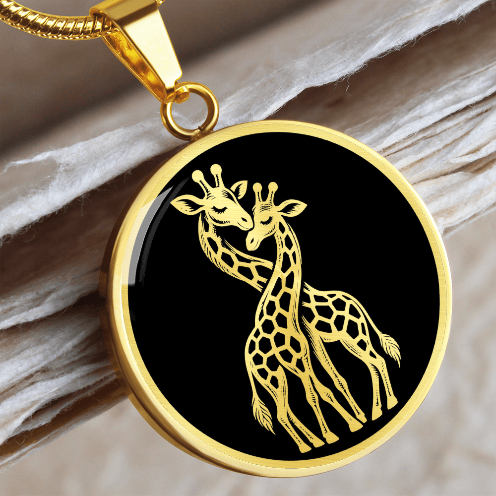 Gold finish two giraffes necklace featuring gold-toned artwork of intertwined giraffes against a black round pendant.