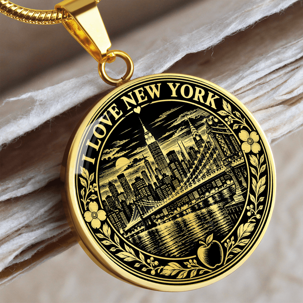 Close-up silver NYC pendant with detailed black and white skyline illustration and floral frame