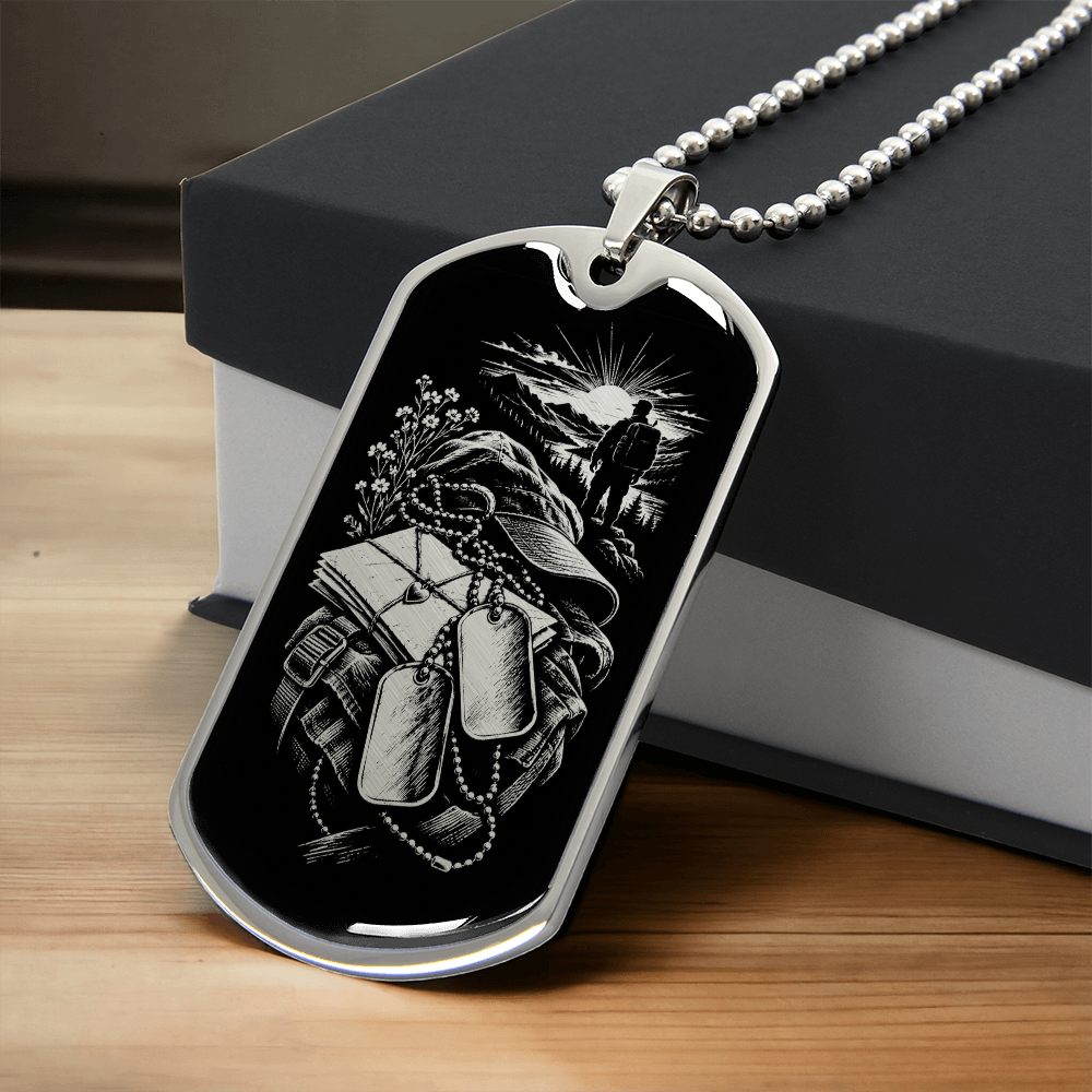 Silver military long distance dog tag necklace featuring backpack, tied letters, miniature dog tags, wildflowers and a lone figure against a radiant horizon.