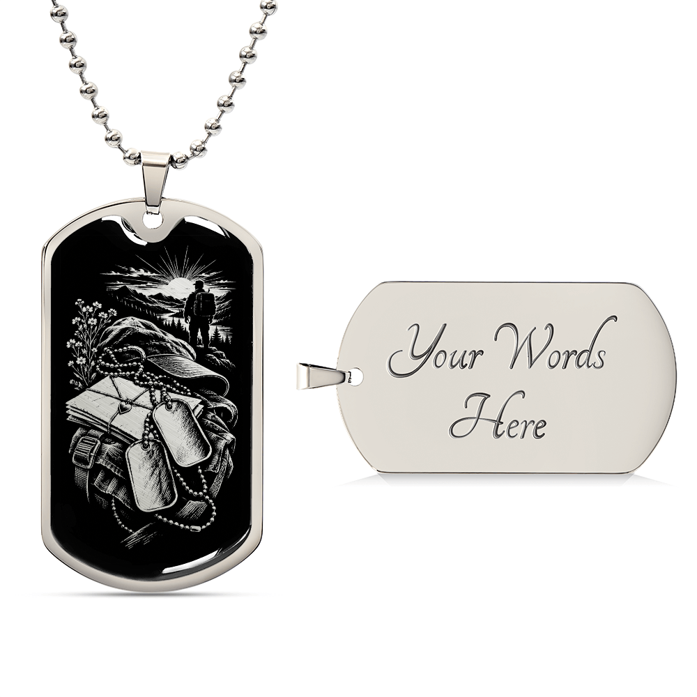 Close-up of silver deployment necklace showing tied envelopes with heart, two hanging military-style tags and flowers beside a backpack.