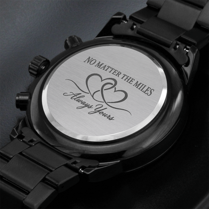 Black stainless-steel men's watch with matching link bracelet, three subdials, date display and minimalist hour markers.