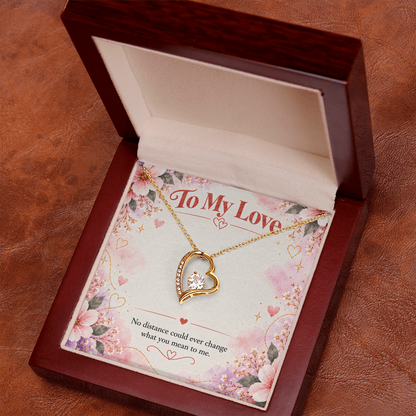 18K yellow gold finish Forever Love heart necklace with 6.5 mm cubic zirconia crystal and romantic long-distance message card.