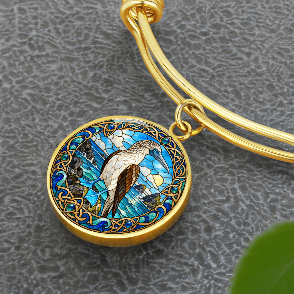 Booby bracelet with stained-glass-style seabird charm and blue ocean artwork