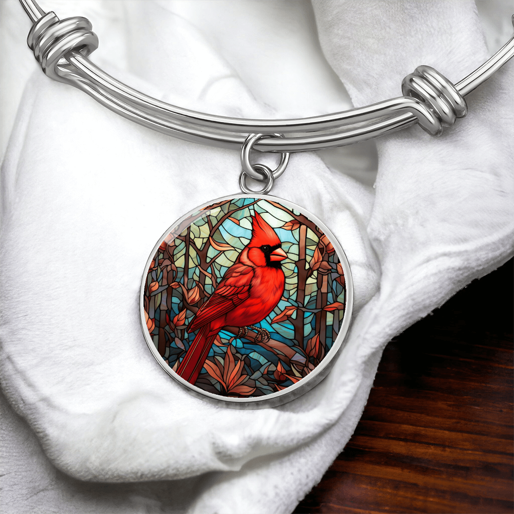 Close-up of red cardinal bird charm on cardinal bracelet
