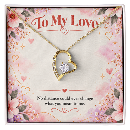 14K white gold finish Forever Love necklace featuring an open-heart pendant with clear cubic zirconia stones on a floral message card.